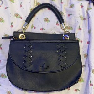Black Danielle Nicole bag. It comes with a black strap too